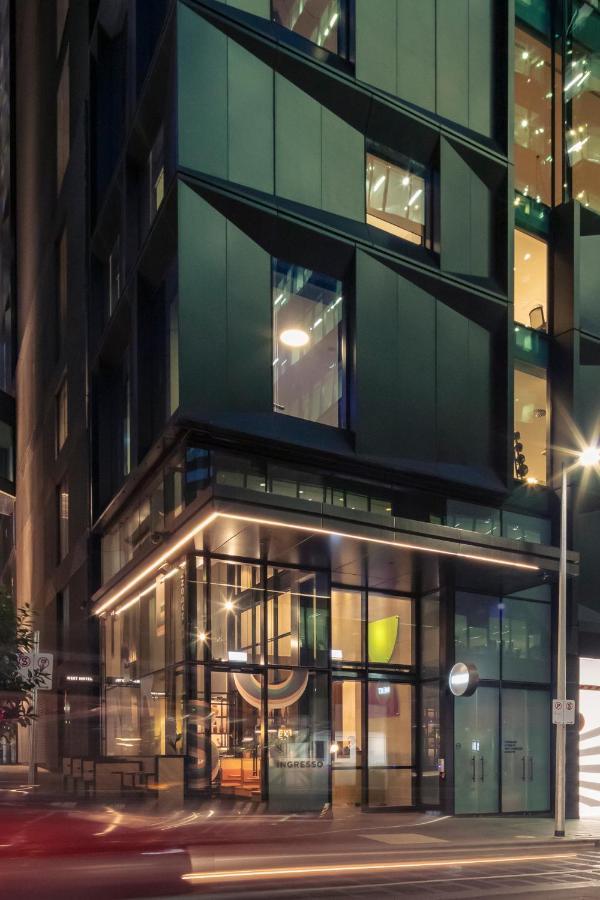 Next Hotel Melbourne, Curio Collection By Hilton Kültér fotó The entrance to the hotel